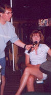 Nicole sings along